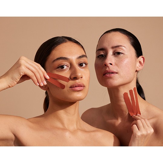 face taping facial treatment, facialist, anti-wrinkle tapes, natural lifting, facial tape strips, wrinkle smoothing treatment